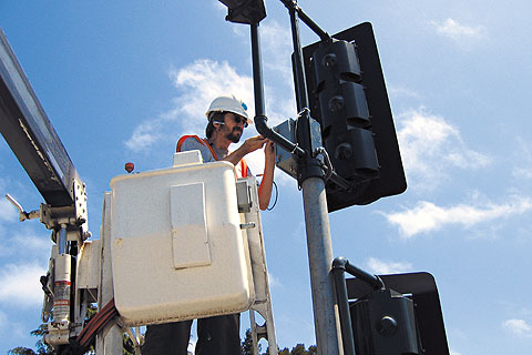  Wave Radio Modules (WRM) and antennae are mounted on traffic light posts. If the vehicle-to-vehicle communication tests are a successful,  around 300,000 roadside units, like this one in California, would be installed across the U.S. for the future DSRC network.